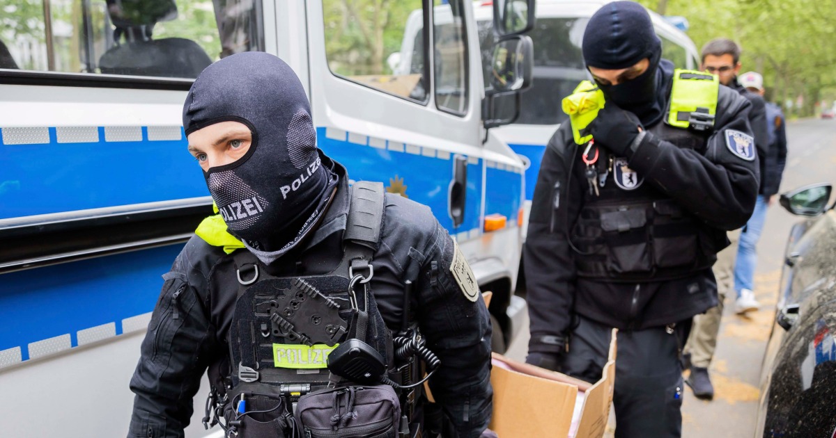 German police conduct raids on climate activists as impatience mounts