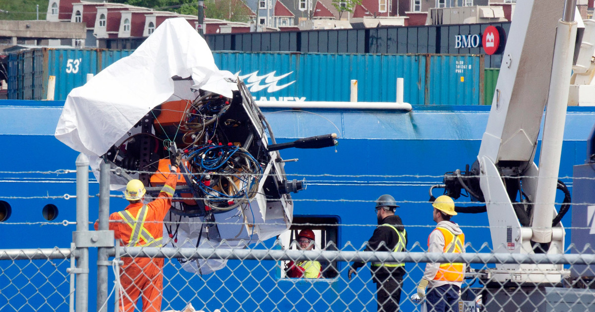 Human remains and debris from sub returned to land after fatal implosion near Titanic site