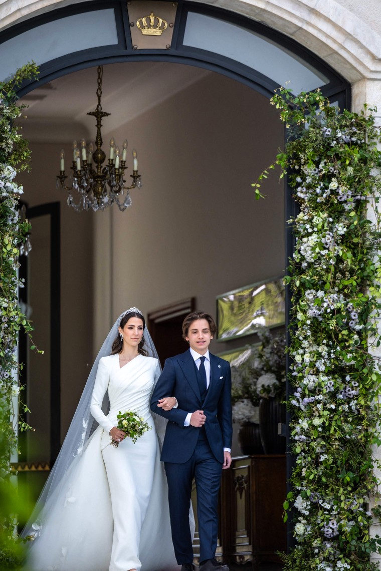 Image: Jordan's Prince Hashem bin Abdullah walking with Rajwa al-Said at the Zahran Palace in Amman on June 1, 2023 on the day of her royal wedding ceremony to Crown Prince Hussein. 