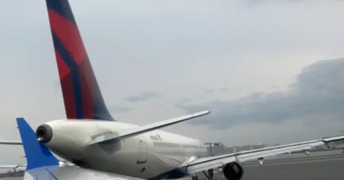 Love tap on the tarmac: Video shows Delta and United planes in slow-motion bump at Boston airport