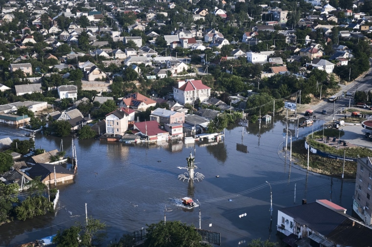 Residents of southern Ukraine, some who spent the night on rooftops, braced for a second day of swelling floodwaters on Wednesday as authorities warned that a Dnieper River dam breach would continue to unleash pent-up waters from a giant reservoir. 