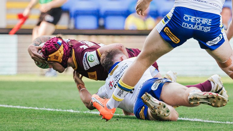 Huddersfield’s Theo Fages scores a try