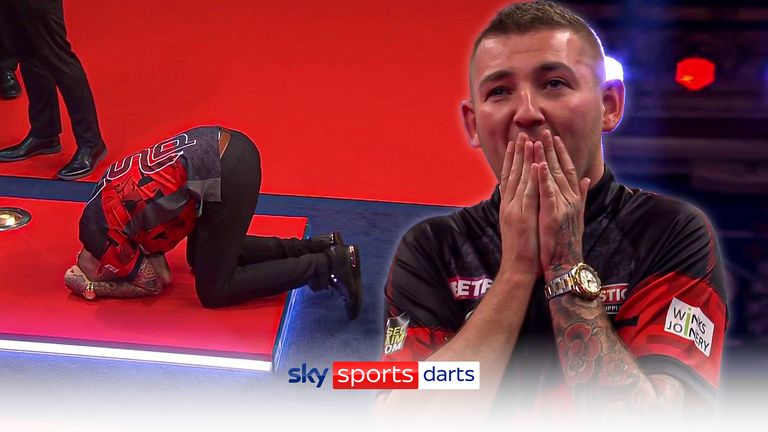 Aspinall completed a stunning win before falling to his knees in celebration