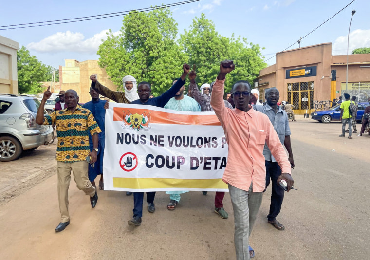 Supporters of Nigerian President Mohamed Bazoum demonstrate in his support in Niamey, Niger on July 26, 2023.