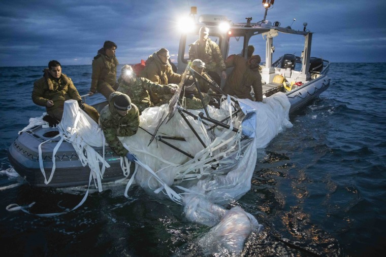 U.S. Navy sailors recover a high-altitude surveillance balloon off the coast of Myrtle Beach, S.C. on Feb. 5, 2023.