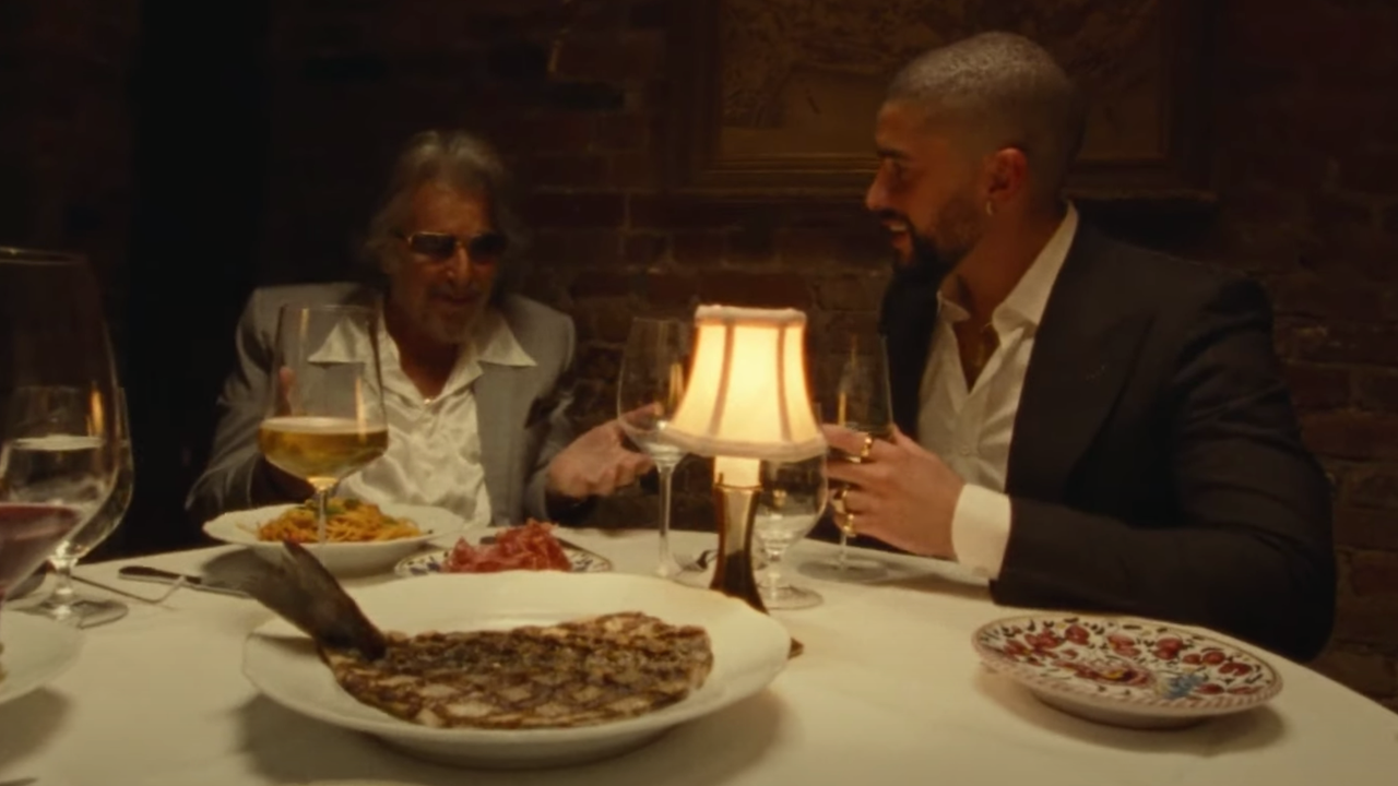 Bad Bunny Dines With Al Pacino in New “Monaco” Video: Watch