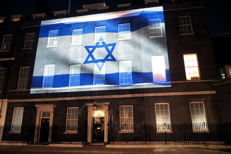 Image: UK Government Beam Israel's Flag Onto Downing Street In Show Of Support