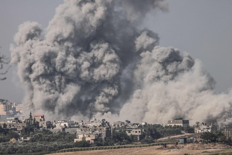 Smoke rises over the northern Gaza Strip following an Israeli strike on Oct. 7, 2023.