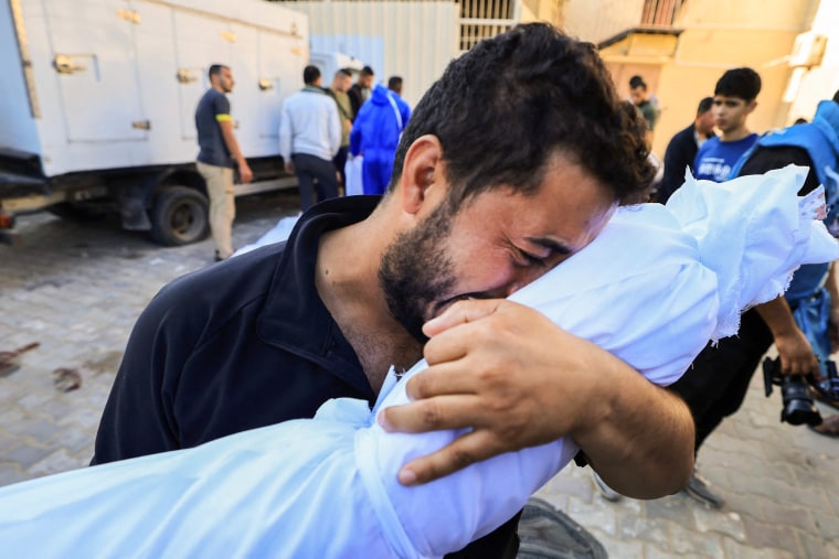 A man mourns the death of his relative in Gaza.