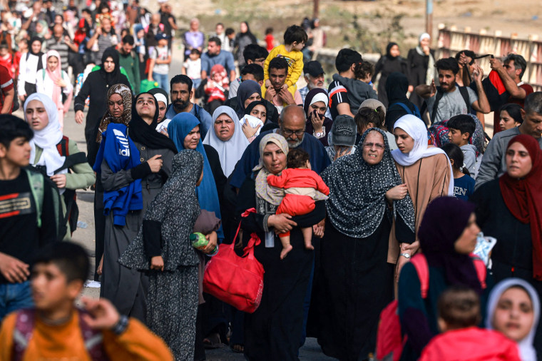 People flee Gaza City.