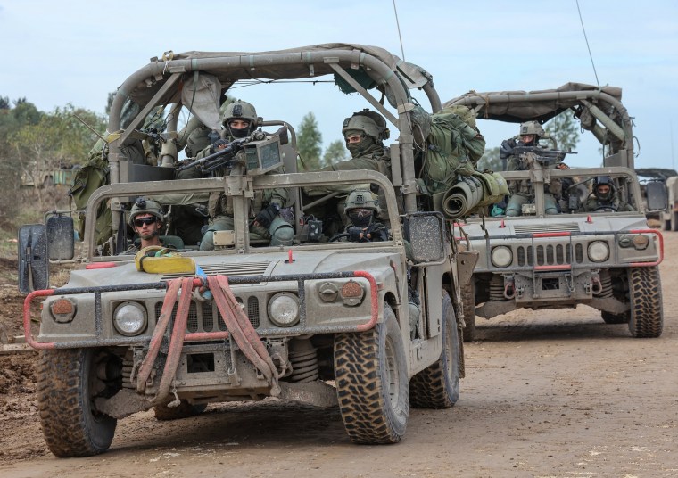 Israeli troops patrol on the southern border with the Gaza Strip on Nov. 28, 2023.