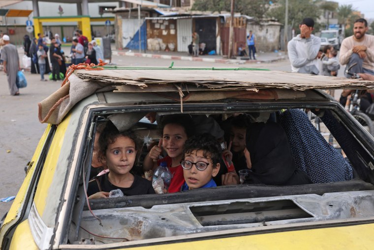 Palestinians arrive in Khan Younis in the southern Gaza Strip on Nov. 11, 2023, after fleeing their homes in Gaza City and the northern Gaza Strip.