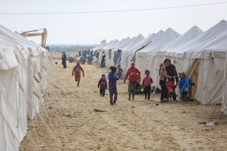 Displaced Palestinian children at a tent city in Khan Younis, Gaza, on Jan. 2, 2024.