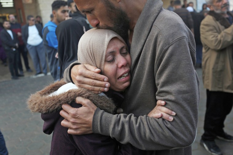 Palestinians receive bodies of deceased relatives from Al-Aqsa Martyrs Hospital