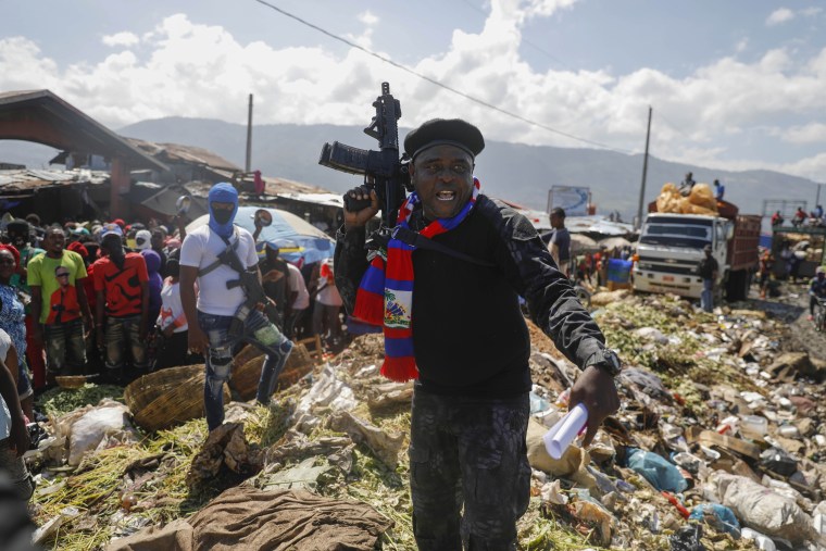 In Haiti, a police officer-turned-gangster is trying to seize control of the country