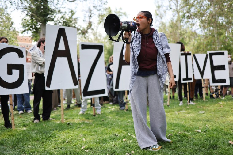 Pro-Palestine demonstrators rally at an encampment in support of Gaza at the University of Southern California