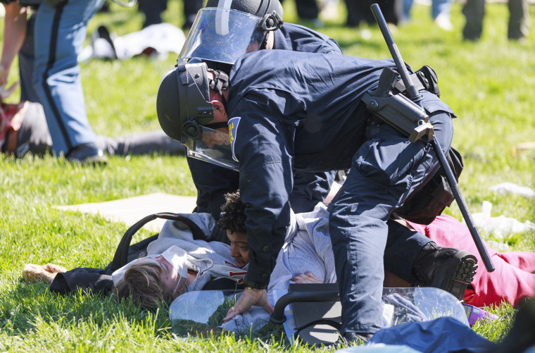 Dozens of people are arrested by the Indiana State Police riot squad during a pro-Palestinian protest on Indiana University's campus