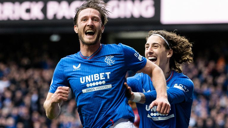 Rangers' Ben Davies celebrates with Fabio Silva (R) after scoring to make it 2-1