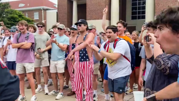 A video still of hecklers shouting at a pro-Palestinian protester