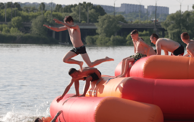 Boys take advantage of the relative calm to cool off in the Kharkiv River.