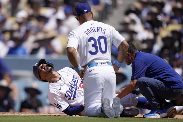 Dodgers star Mookie Betts breaks left hand and it’s not clear when the MVP candidate will return