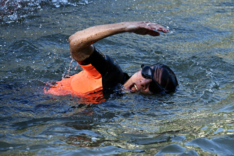 Paris mayor swims in Seine to show long-polluted river is clean enough for the Olympics