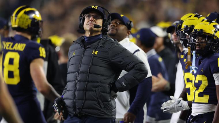 Former Michigan coach Jim Harbaugh slapped with show-cause penalty