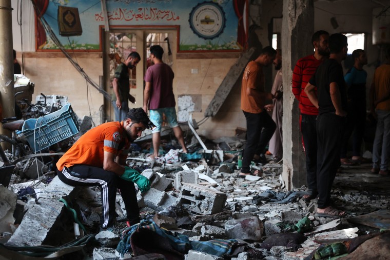 An Israeli airstrike on a school used as temporary shelter for displaced Palestinians killed more than 90 people.