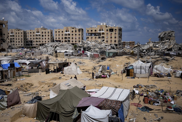 Palestinians displaced by the Israeli air and ground offensive on the Gaza Strip flee from Hamad City, following an evacuation order by the Israeli army to leave parts of the southern area of Khan Younis on Aug. 11, 2024.