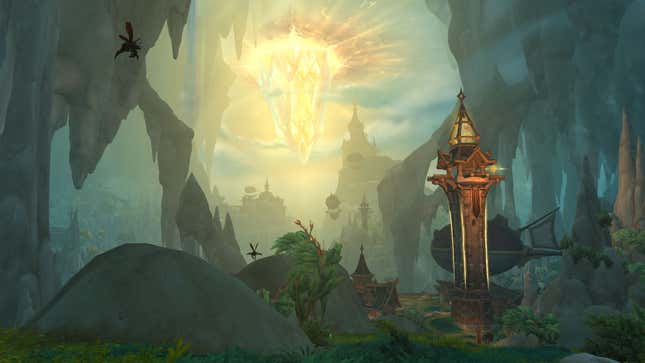 The region of Hallowfall, with a massive glowing crystal hanging down from above.