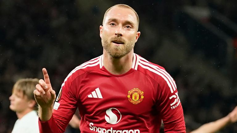 Manchester United's Christian Eriksen celebrates after scoring the opening goal during the Europa League opening phase against Twente