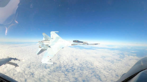 Startling Video Shows Russian Fighter Jet Flying Within Feet of US F-16 near Alaska