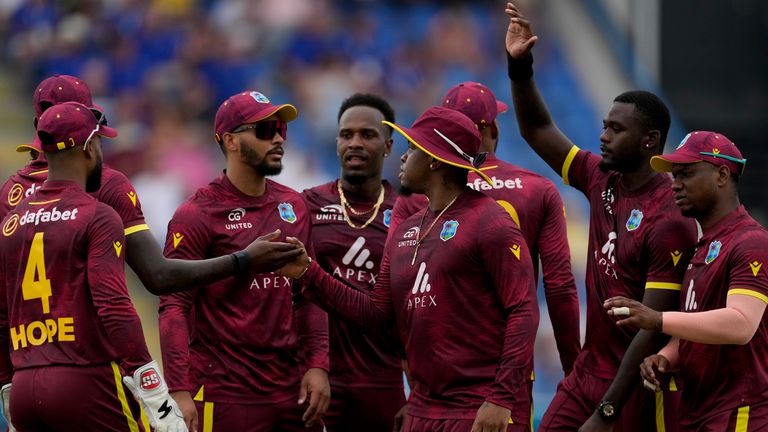 West Indies' players celebrate dismissing England's Phil Salt during the first ODI cricket match at Sir Vivian Richards Ground in North Sound, Antigua and Barbuda, Thursday, Oct. 31, 2024. (AP Photo/Ricardo Mazalan)