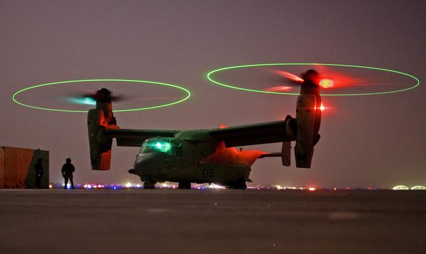 A V-22 Osprey tilt rotor aircraft taxis during a mission in western Iraqi desert